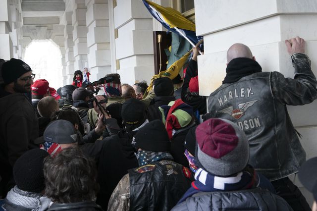 Supporters of Donald Trump storm the US Capitol entrance